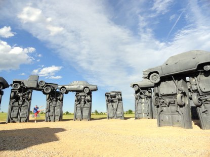 Tourist trap of the day, Carhenge! Just outside Alliance, Nebraska, vintage cars have been arranged in the same layout as the English original. Why? Why not?